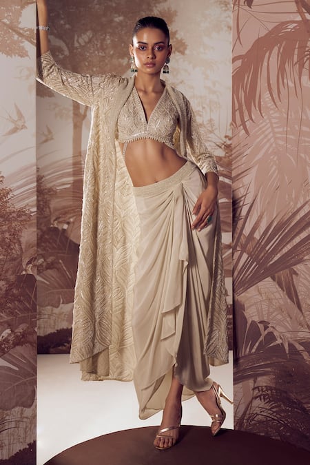 Shop Sana Barreja Ivory Net, Silk Sequins, Cut Work Rena Foliage Embellished Jacket Skirt Set at Aza Fashions Shop_Sana Barreja_Ivory Net, Silk Sequins, Cut Work Rena Foliage Embellished Jacket Skirt Set _at_Aza_Fashions