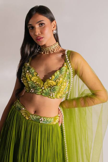 Anshika Tak Label_Green Tussar, Georgette, Net Pearls, Cut Work Plunge Neck Layered Lehenga Set _at_Aza_Fashions