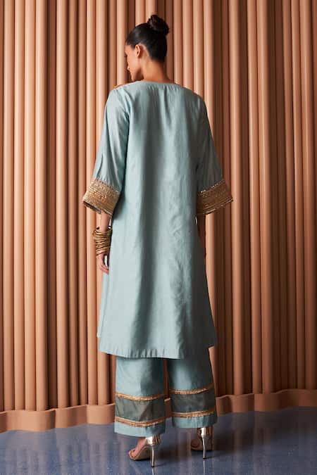 Shop Rishi and Vibhuti Blue Chanderi Sequins Square Neck Caroline Lace Embellished Kurta With Pant at Aza Fashions Shop_Rishi and Vibhuti_Blue Chanderi Sequins Square Neck Caroline Lace Embellished Kurta With Pant _at_Aza_Fashions