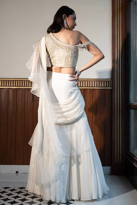 Shop Mehak Sharma Ivory Organza, Crepe Pearls, Sequins, Ruffle Border Pre Draped Saree With Blouse at Aza Fashions Shop_Mehak Sharma_Ivory Organza, Crepe Pearls, Sequins, Ruffle Border Pre Draped Saree With Blouse _at_Aza_Fashions