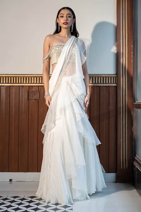 Shop Mehak Sharma Ivory Organza, Crepe Pearls, Sequins, Ruffle Border Pre Draped Saree With Blouse Online at Aza Fashions Shop_Mehak Sharma_Ivory Organza, Crepe Pearls, Sequins, Ruffle Border Pre Draped Saree With Blouse _Online_at_Aza_Fashions