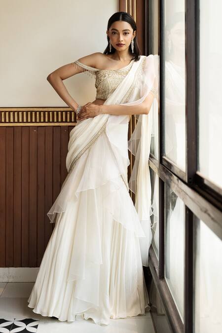 Mehak Sharma Ivory Organza, Crepe Pearls, Sequins, Ruffle Border Pre Draped Saree With Blouse at Aza Fashions Mehak Sharma_Ivory Organza, Crepe Pearls, Sequins, Ruffle Border Pre Draped Saree With Blouse _at_Aza_Fashions