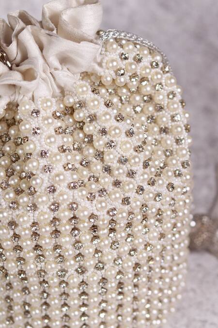 Shop The Tan Clan White Embroidery, Beads Chhaya Potli Bag With Handle Online at Aza Fashions Shop_The Tan Clan_White Embroidery, Beads Chhaya Potli Bag With Handle _Online_at_Aza_Fashions