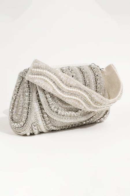 The Tan Clan_White Embroidery, Rhinestones, Pearls Chloe Flap Over Clutch Bag _at_Aza_Fashions