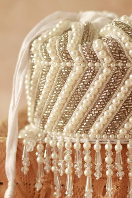 Shop The Tan Clan White Pearls, Cut Work Petite Embroidered Mini Potli Bag Online at Aza Fashions Shop_The Tan Clan_White Pearls, Cut Work Petite Embroidered Mini Potli Bag _Online_at_Aza_Fashions