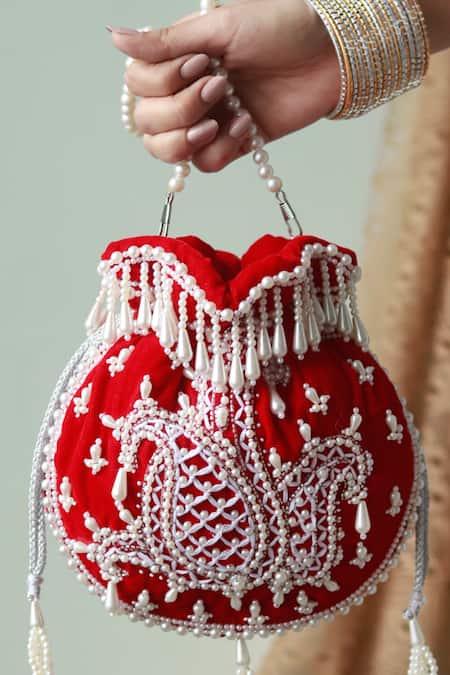 Shop_The Tan Clan_Red Pearls Sukoon Embellished Potli _Online_at_Aza_Fashions
