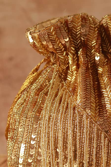 The Tan Clan_Gold Beads Twinkle Tassels Potli _Online_at_Aza_Fashions
