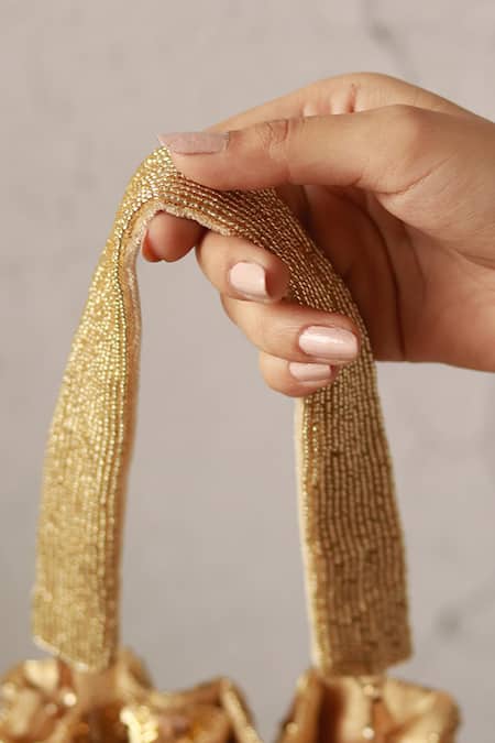 Buy_The Tan Clan_Gold Beads Twinkle Tassels Potli _Online_at_Aza_Fashions