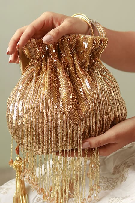 Shop_The Tan Clan_Gold Beads Twinkle Tassels Potli _Online_at_Aza_Fashions