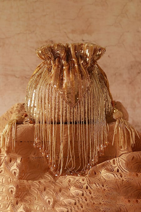 The Tan Clan_Gold Beads Twinkle Tassels Potli _at_Aza_Fashions