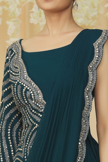 Buy Samyukta Singhania Blue Georgette Sequins, Pearls, Crystals Pre-draped Saree With Asymmetric Choli Online at Aza Fashions Buy_Samyukta Singhania_Blue Georgette Sequins, Pearls, Crystals Pre-draped Saree With Asymmetric Choli _Online_at_Aza_Fashions