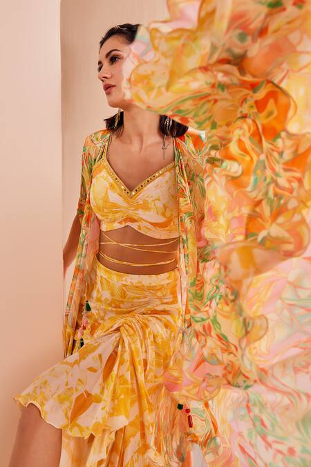 Buy Mandira Wirk - Indian Yellow Chiffon Embroidery, Mirrors V-neck Fluorescent Cape Skirt Set Online at Aza Fashions Buy_Mandira Wirk - Indian_Yellow Chiffon Embroidery, Mirrors V-neck Fluorescent Cape Skirt Set _Online_at_Aza_Fashions