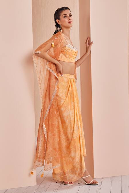 Buy Mandira Wirk - Indian Orange Chiffon Pearls, Beads, Embroidery Abstract Pattern Cape Skirt Set Online at Aza Fashions Buy_Mandira Wirk - Indian_Orange Chiffon Pearls, Beads, Embroidery Abstract Pattern Cape Skirt Set _Online_at_Aza_Fashions