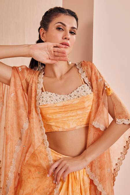 Shop Mandira Wirk - Indian Orange Chiffon Pearls, Beads, Embroidery Abstract Pattern Cape Skirt Set Online at Aza Fashions Shop_Mandira Wirk - Indian_Orange Chiffon Pearls, Beads, Embroidery Abstract Pattern Cape Skirt Set _Online_at_Aza_Fashions