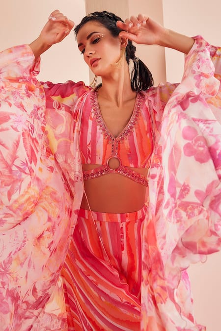 Shop Mandira Wirk - Indian Pink Chiffon V-neck Printed Sharara Set With Floral Pattern Cape Online at Aza Fashions Shop_Mandira Wirk - Indian_Pink Chiffon V-neck Printed Sharara Set With Floral Pattern Cape _Online_at_Aza_Fashions
