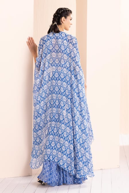 Mandira Wirk - Indian Blue Chiffon, Crepe, Net Mirrors, Tassels Floral Print Cape With Sharara Set Online at Aza Fashions Mandira Wirk - Indian_Blue Chiffon, Crepe, Net Mirrors, Tassels Floral Print Cape With Sharara Set _Online_at_Aza_Fashions