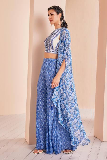 Buy Mandira Wirk - Indian Blue Chiffon, Crepe, Net Mirrors, Tassels Floral Print Cape With Sharara Set Online at Aza Fashions Buy_Mandira Wirk - Indian_Blue Chiffon, Crepe, Net Mirrors, Tassels Floral Print Cape With Sharara Set _Online_at_Aza_Fashions