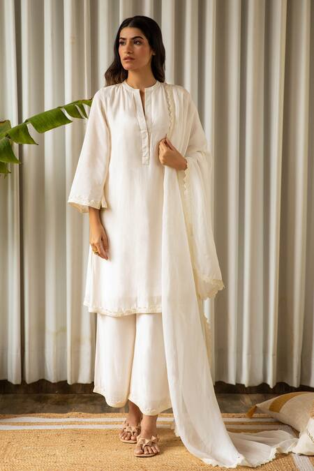 Shop Kapraaaha Off White Muslin Lace Round Neck Embellished Kurta Palazzo Pant Set at Aza Fashions Shop_Kapraaaha_Off White Muslin Lace Round Neck Embellished Kurta Palazzo Pant Set_at_Aza_Fashions