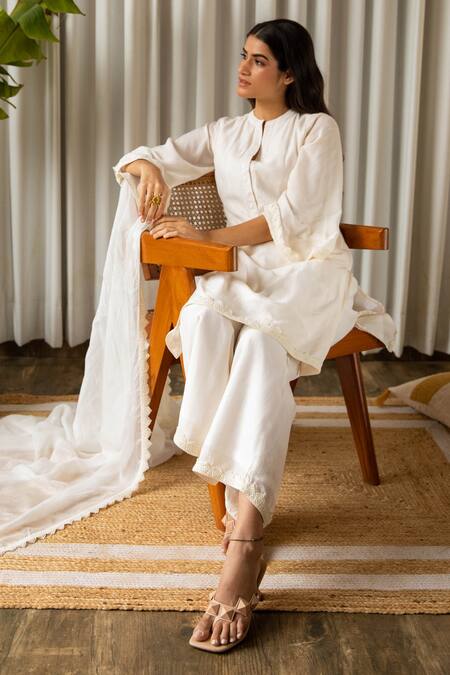 Buy Kapraaaha Off White Muslin Lace Round Neck Embellished Kurta Palazzo Pant Set Online at Aza Fashions Buy_Kapraaaha_Off White Muslin Lace Round Neck Embellished Kurta Palazzo Pant Set_Online_at_Aza_Fashions