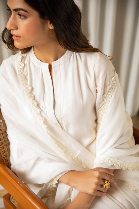 Shop Kapraaaha Off White Muslin Lace Round Neck Embellished Kurta Palazzo Pant Set Online at Aza Fashions Shop_Kapraaaha_Off White Muslin Lace Round Neck Embellished Kurta Palazzo Pant Set_Online_at_Aza_Fashions