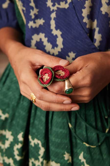 Shop_Cord_Emerald Green Cotton Embroidery V-neck Poem Spiral Print Peplum Top_Online_at_Aza_Fashions