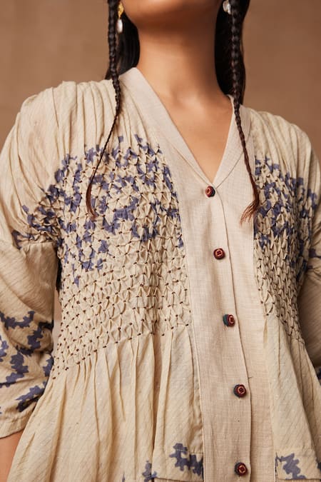 Buy_Cord_White Cotton Embroidery V-neck Jade Spiral Print Top _Online_at_Aza_Fashions