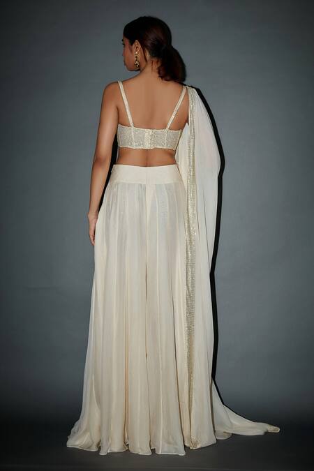 Shop Itrh Off White Net, Chiffon Crystals Sweetheart Grace Embellished Corset Sharara Set at Aza Fashions Shop_Itrh_Off White Net, Chiffon Crystals Sweetheart Grace Embellished Corset Sharara Set_at_Aza_Fashions