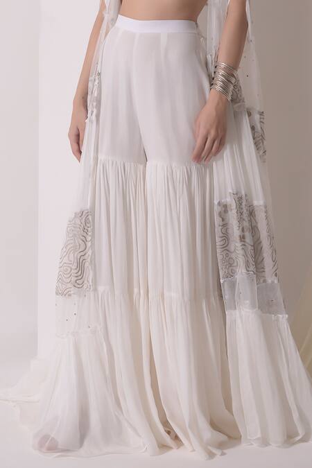 Shwetanga White Organza, Crepe, Muslin Sequins, Foil Printing Layered Jacket Sharara Set Online at Aza Fashions Shwetanga_White Organza, Crepe, Muslin Sequins, Foil Printing Layered Jacket Sharara Set _Online_at_Aza_Fashions