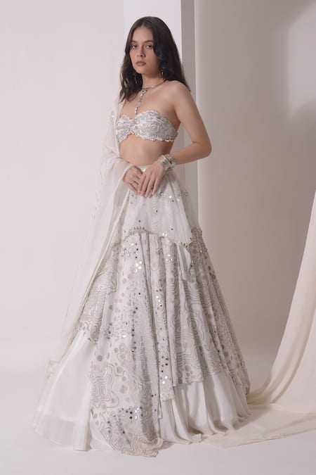 Shop Shwetanga White Organza, Crepe Sequins, Embellished Asymmetric Layered Lehenga Bustier Set Online at Aza Fashions Shop_Shwetanga_White Organza, Crepe Sequins, Embellished Asymmetric Layered Lehenga Bustier Set _Online_at_Aza_Fashions