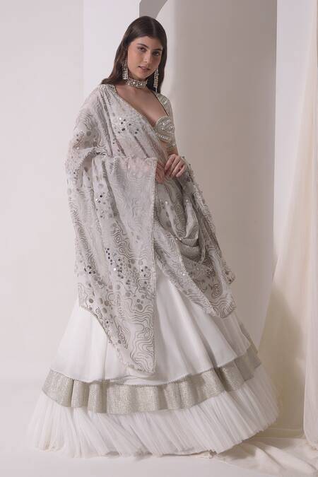 Buy Shwetanga White Organza, Crepe Sequins, Gota Patti Round Embellished Tiered Lehenga Set Online at Aza Fashions Buy_Shwetanga_White Organza, Crepe Sequins, Gota Patti Round Embellished Tiered Lehenga Set _Online_at_Aza_Fashions