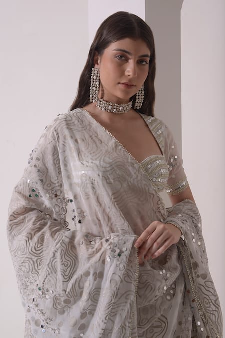 Shwetanga White Organza, Crepe Sequins, Gota Patti Round Embellished Tiered Lehenga Set at Aza Fashions Shwetanga_White Organza, Crepe Sequins, Gota Patti Round Embellished Tiered Lehenga Set _at_Aza_Fashions