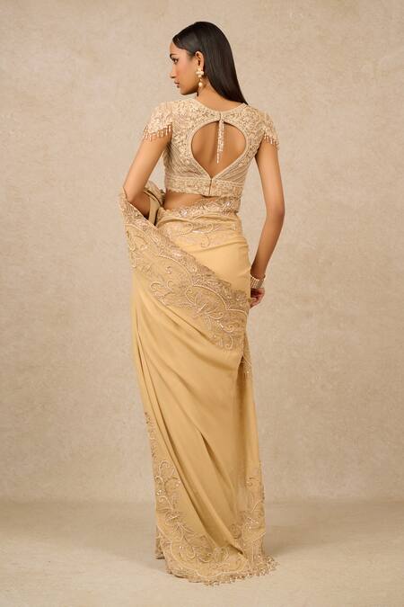 Shop Tarun Tahiliani Gold Silk Pearls, Sequins, Embroidery Floral Cutwork Border Saree With Blouse at Aza Fashions Shop_Tarun Tahiliani_Gold Silk Pearls, Sequins, Embroidery Floral Cutwork Border Saree With Blouse_at_Aza_Fashions