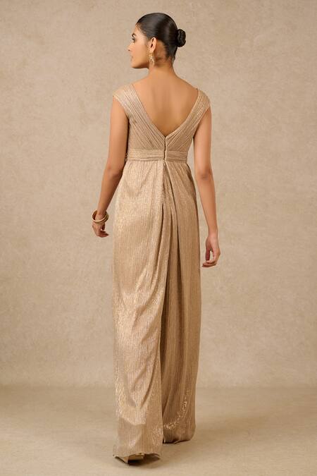 Shop Tarun Tahiliani Beige Lurex Sequins Boat Neck Bodice Embroidered Metallic Jumpsuit at Aza Fashions Shop_Tarun Tahiliani_Beige Lurex Sequins Boat Neck Bodice Embroidered Metallic Jumpsuit_at_Aza_Fashions