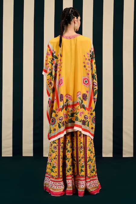 Shop Swati Vijaivargie Yellow Habutai Silk Pansy Buttercup Print Tunic Kurta With Sharara at Aza Fashions Shop_Swati Vijaivargie_Yellow Habutai Silk Pansy Buttercup Print Tunic Kurta With Sharara _at_Aza_Fashions