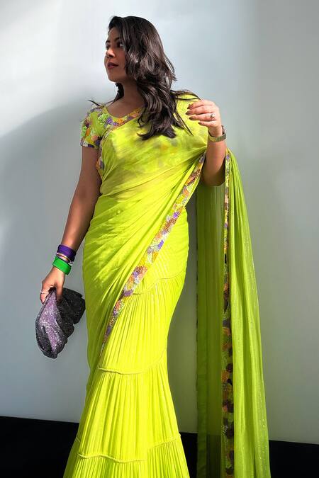 Nirmooha Green Lurex, Silk, Nylon Embroidery Floral Border Pre-draped Saree With Blouse at Aza Fashions Nirmooha_Green Lurex, Silk, Nylon Embroidery Floral Border Pre-draped Saree With Blouse _at_Aza_Fashions