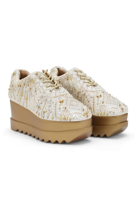 White and best sale gold wedge sneakers