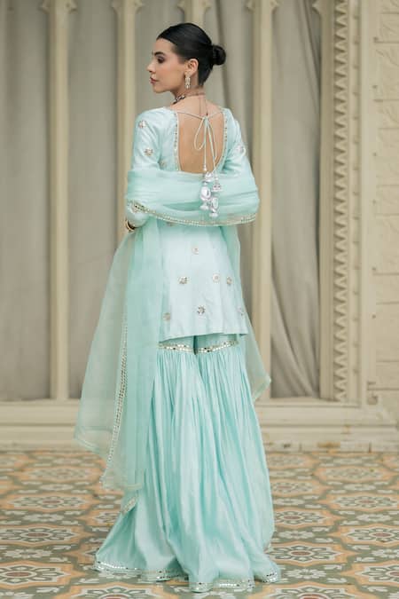 Shop Esha Koul Blue Chanderi, Organza, Linen Mirrors Boat Embroidered Peplum Kurta Sharara Set at Aza Fashions Shop_Esha Koul_Blue Chanderi, Organza, Linen Mirrors Boat Embroidered Peplum Kurta Sharara Set _at_Aza_Fashions