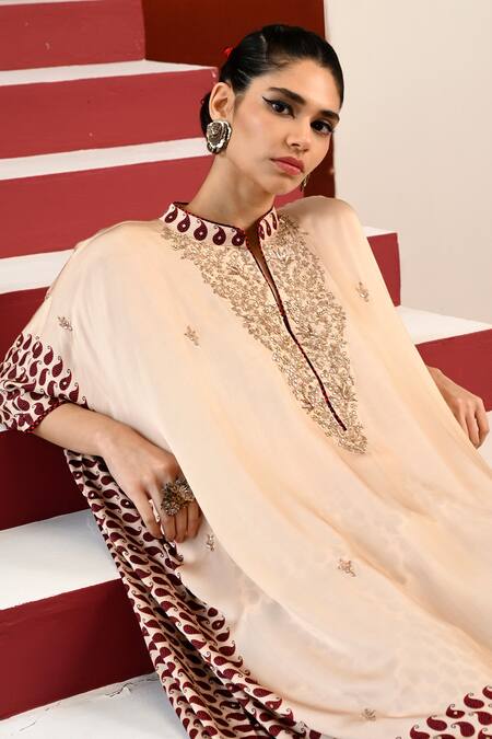 Swati Vijaivargie Off White Bemberg Modal Satin Pansy Paisley Print Tunic With Sharara at Aza Fashions Swati Vijaivargie_Off White Bemberg Modal Satin Pansy Paisley Print Tunic With Sharara _at_Aza_Fashions