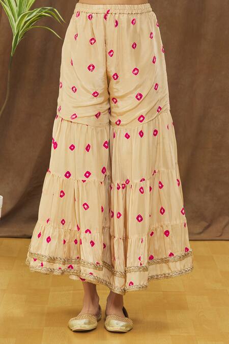 Samyukta Singhania_Gold Kurta And Sharara Silk Bandhani V Neck Pattern Set_at_Aza_Fashions