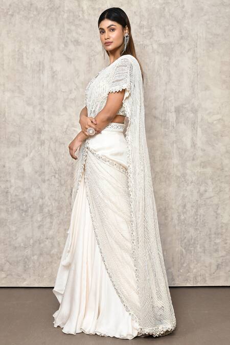 Ritika Mirchandani_Ivory Crepe Embroidery Thread Leaf Neck Lehenga Saree With Blouse  _Online_at_Aza_Fashions