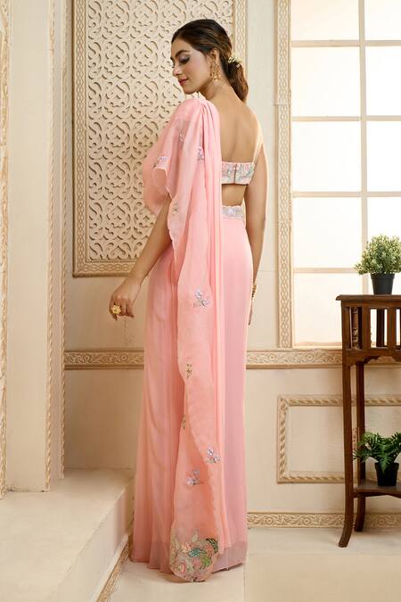 Shop Aariyana Couture Peach Viscose, Silk Satin Embroidery Pre-draped Saree With Shell Bustier at Aza Fashions Shop_Aariyana Couture_Peach Viscose, Silk Satin Embroidery Pre-draped Saree With Shell Bustier_at_Aza_Fashions
