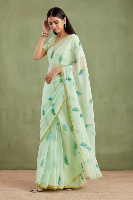 Geroo Jaipur Green Chiffon, Jacquard Leaf Hand Painted Saree With Unstitched Blouse Piece at Aza Fashions Geroo Jaipur_Green Chiffon, Jacquard Leaf Hand Painted Saree With Unstitched Blouse Piece_at_Aza_Fashions