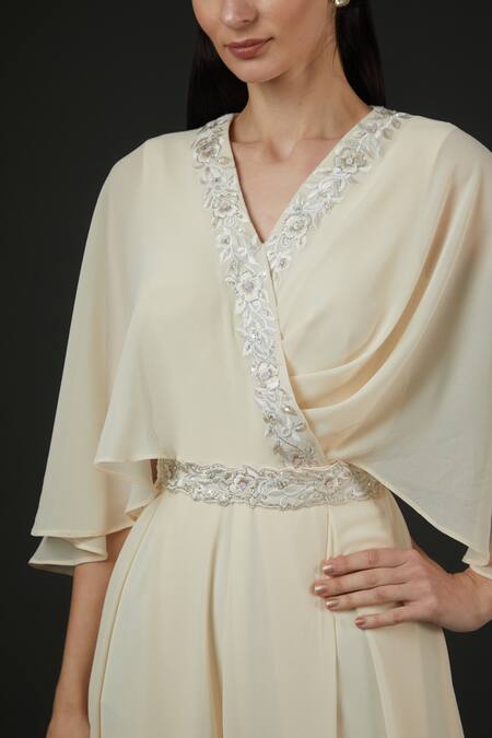 Vedika Soni_Ivory Georgette Embroidery, Sequins V-neck Neckline Jumpsuit With Belt _Online_at_Aza_Fashions