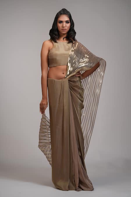 Shruti S_Gold Organza, Crepe, Silk Zari Round Neck Metallic Pre-draped Saree With Blouse _at_Aza_Fashions