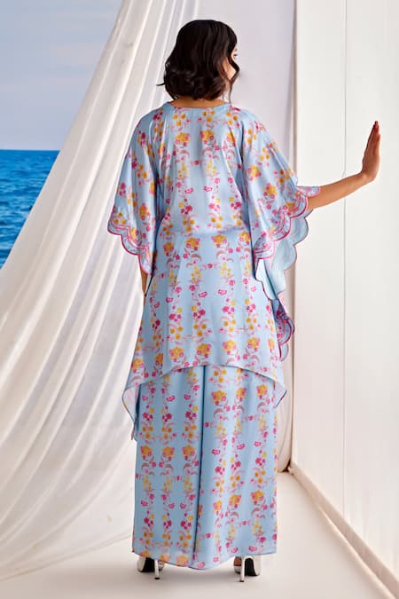 Shop Tarini Vij Blue Satin, Georgette Embroidery Sway Floral Print Kaftan And Flared Pant Set at Aza Fashions Shop_Tarini Vij_Blue Satin, Georgette Embroidery Sway Floral Print Kaftan And Flared Pant Set _at_Aza_Fashions