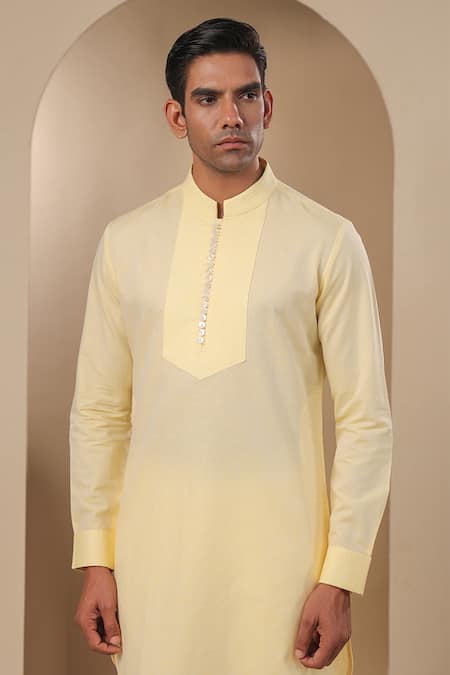 Shop Raw & Rustic By Niti Bothra Yellow Chanderi, Silk Embroidery Pleated Placket Solid Kurta Online at Aza Fashions Shop_Raw & Rustic By Niti Bothra_Yellow Chanderi, Silk Embroidery Pleated Placket Solid Kurta _Online_at_Aza_Fashions