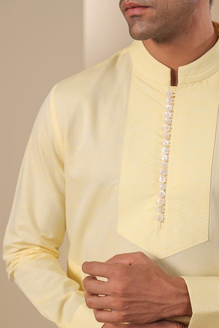 Raw & Rustic By Niti Bothra Yellow Chanderi, Silk Embroidery Pleated Placket Solid Kurta at Aza Fashions Raw & Rustic By Niti Bothra_Yellow Chanderi, Silk Embroidery Pleated Placket Solid Kurta _at_Aza_Fashions