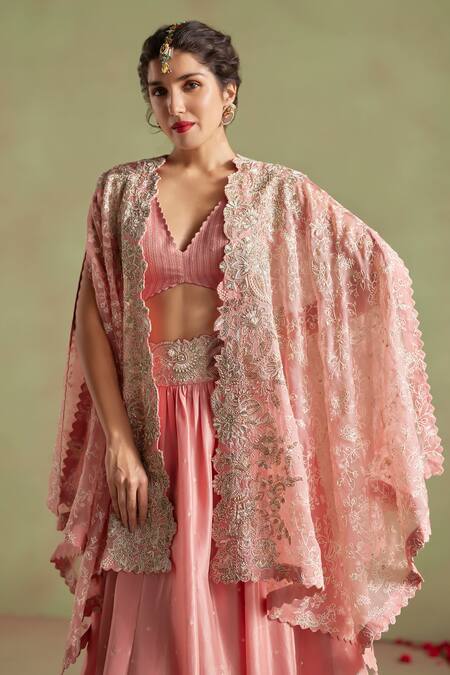 Mrunalini Rao_Peach Silk Pearls, Sequins V-neck Bhuvi Resham Embroidered Cape Lehenga Set _Online_at_Aza_Fashions