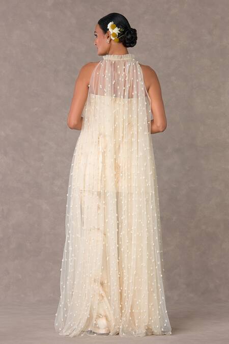 Shop_Masaba_Ivory Silk, Tulle Pearls Racerback Embellished Cape Nargis Print Bell Bottom Set_at_Aza_Fashions