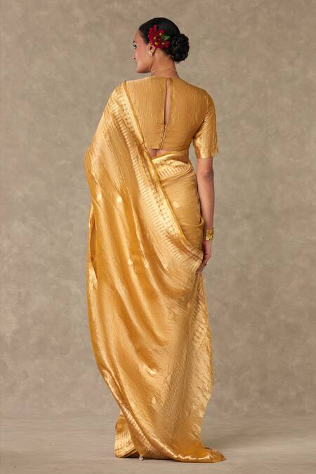 Shop Masaba Gold Tissue Zari Sunehri Saree With Unstitched Blouse Piece at Aza Fashions Shop_Masaba_Gold Tissue Zari Sunehri Saree With Unstitched Blouse Piece_at_Aza_Fashions